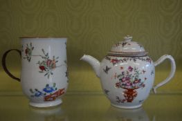 A Famille Rose teapot and cover and a Famille Rose tankard.