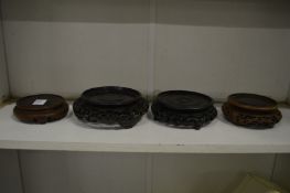 Four Chinese stands.