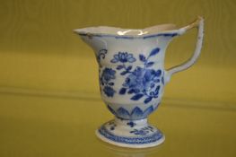 A Chinese blue and white jug.