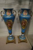A pair of large decorative continental porcelain and ormolu vases (AF).