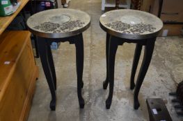 A pair of decorative tables.
