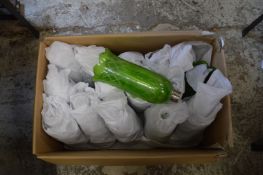 A quantity of green glass lampshades.