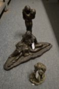 Three bronze resin erotic figure groups.