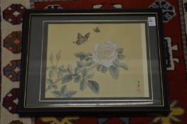 Two Chinese paintings on silk, both framed and glazed.