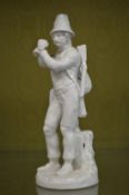 A white porcelain figure of a huntsmen.