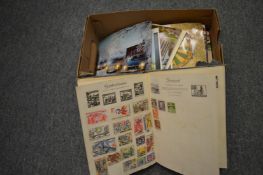 Various postcards and stamps.