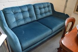 A good modern large teal upholstered two-seater settee.