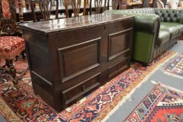 An 18th century oak mule chest.