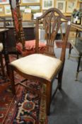 A set of five George III design mahogany dining chairs.