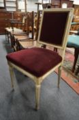 A Regency style cream painted and crimson velvet upholstered side chair.