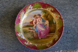 A Vienna circular porcelain dish decorated with classical figures.