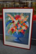 Colourful flowers in a pedestal vase, a limited edition print, signed.