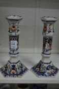 A pair of Delft style candlesticks.