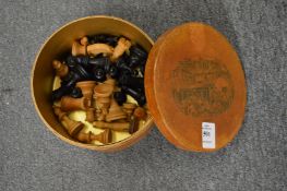 A box containing chess pieces.