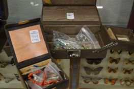 Two jewellery boxes containing bijouterie.