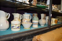 A quantity of pottery jugs and other china.