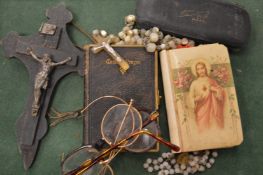 Rosary beads and other items.