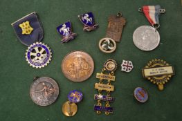A selection of medals and badges.