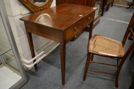 A mahogany two-drawer side table.