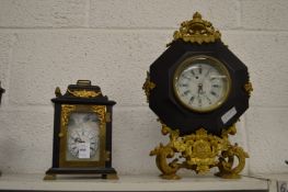 Two decorative mantle clocks.