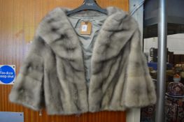 A ladies' fur jacket.