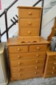 A modern pine chest of drawers and matching three drawer chest.