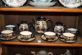 A Satsuma tea service with six cups and saucers.