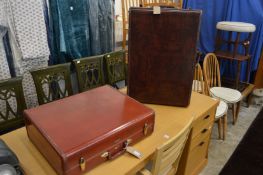 Two old Samsonite suitcases.