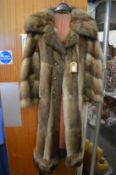 A good ladies' full length fur coat.