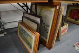 A maple framed photographic print of a shipwreck and various other pictures.