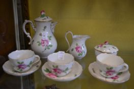 A Dresden floral decorated part tea service.