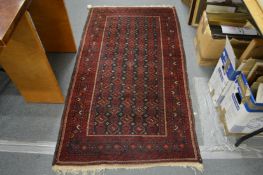 A small Bokhara style rug.