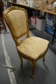 A French gilt decorated side chair (AF).