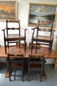 Six 19th century country made oak dining chairs, two with arms.