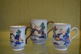 A graduated set of three Chinese baluster shaped mugs.