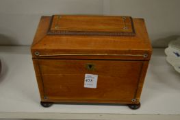 A good George III satinwood sarcophagus shaped tea caddy.