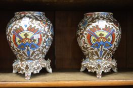 A pair of Vienna porcelain vases decorated in Japanese style.