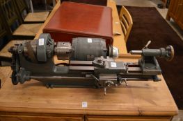 A small machinist's lathe with motor.