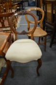 Two Victorian dining chairs.