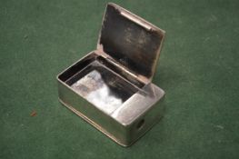 A silver vesta box.