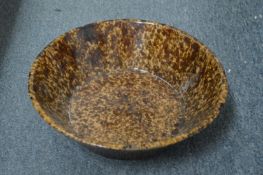 A Tiger's ware circular pottery bowl.