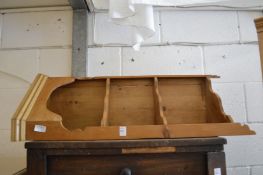 Pine hanging corner shelves.