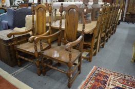 A good set of eight oak high-back dining chairs two with arms.