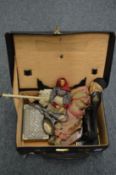 A small leather case containing miscellaneous collectables.