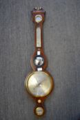 A 19th century mahogany wheel barometer / thermometer.