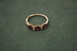 A 9ct gold dress ring.