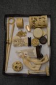 Miscellaneous carved ivory items to include puzzle ball.