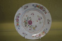 A Famille Rose circular plate.