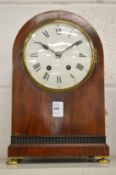 A 19th century mahogany cased arched top mantle clock.
