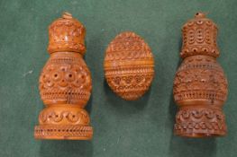 A collection of three coquilla nut pounce pots.